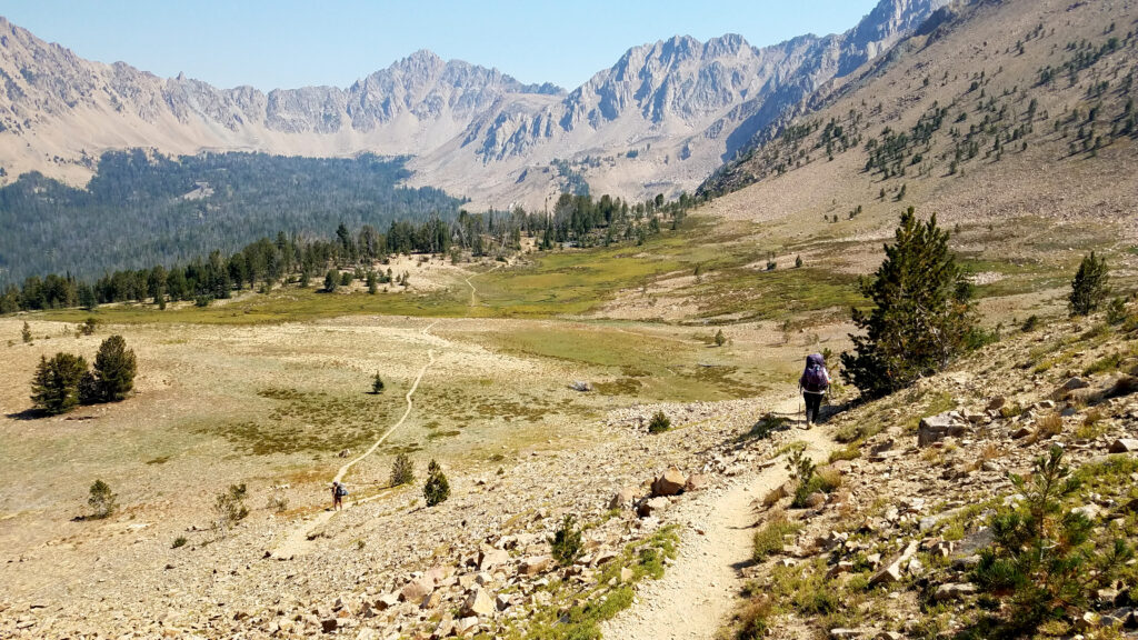 Trail through a mountain basin.